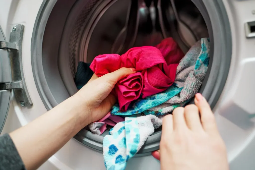 ADDING VINEGAR TO LAUNDRY REMOVES UNPLEASANT ODORS AND STAINS