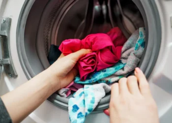 ADDING VINEGAR TO LAUNDRY REMOVES UNPLEASANT ODORS AND STAINS