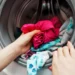 ADDING VINEGAR TO LAUNDRY REMOVES UNPLEASANT ODORS AND STAINS