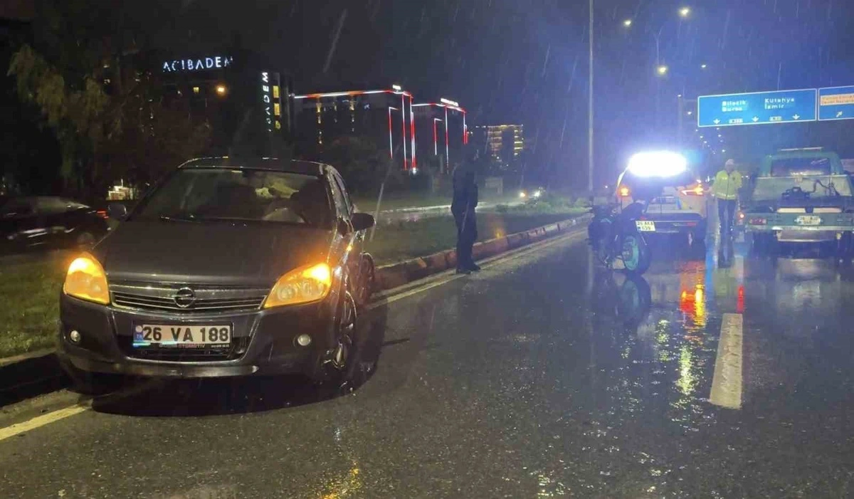 CAR COLLIDES WITH MOTORCYCLE ON SLIPPERY ROAD 1 PERSON INJURED