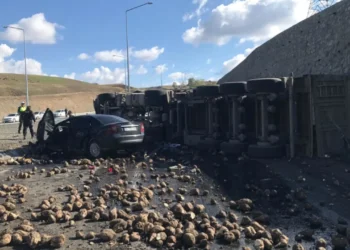 SEMI TRUCK LOADED WITH SUGAR BEETS COLLIDES WITH A CAR IN TRAFFIC ACCIDENT