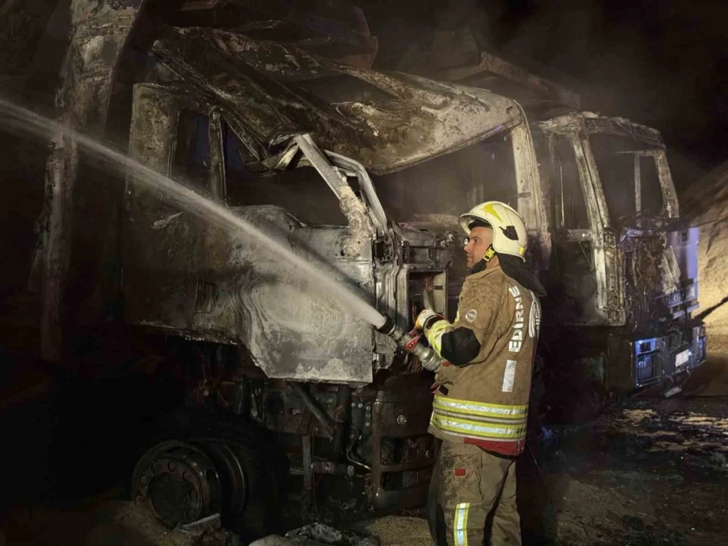 THREE TRUCKS WENT UP IN FLAMES AFTER THE FIRE SPREAD TO THEM